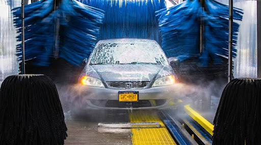 Luxury car in wash tunnel